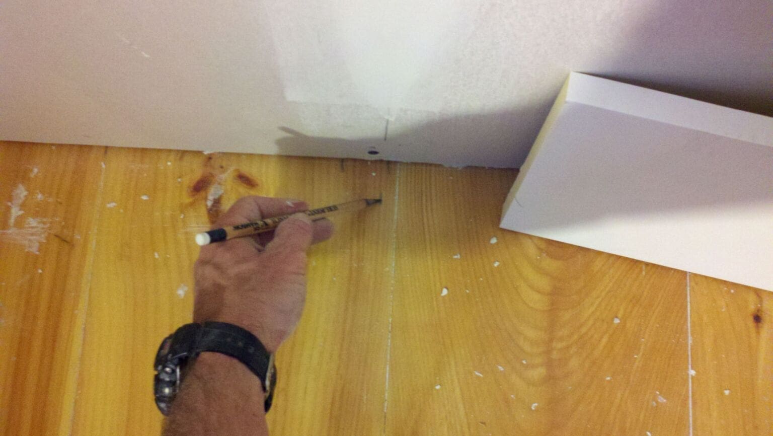 TIP__Baseboard__Floor ‣ MyFixitUpLife ‣ MyFixitUpLife Mark the stud locations on the floor before installing baseboard.