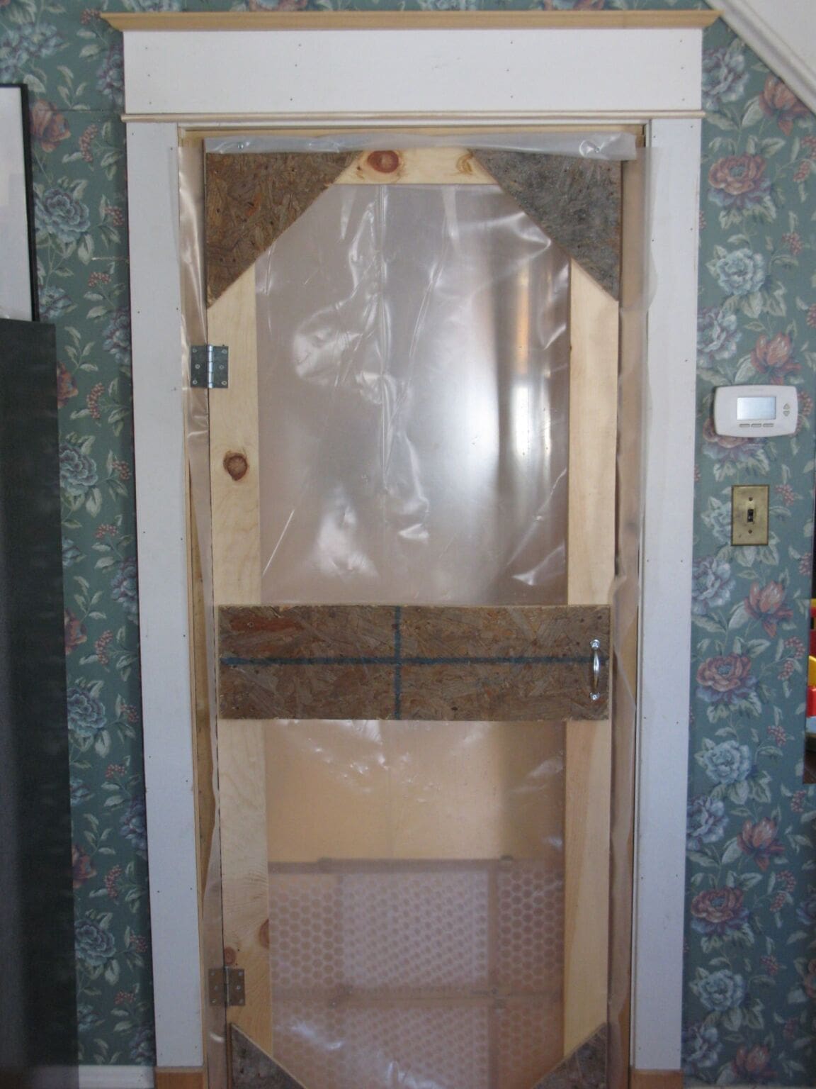 A site built "door" helps control dust without restricting egress.