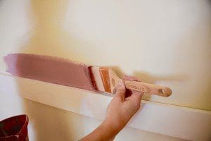 Theresa decided to paint this room a sophisticated shade of purple called Thistle from Sherwin-Williams.