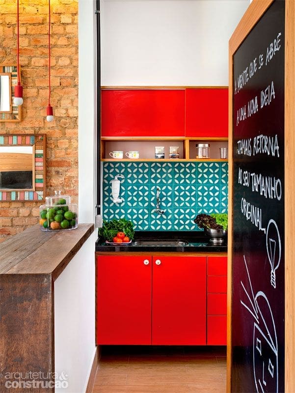 ‣ MyFixitUpLife Turquoise and red have the orangey brick and blackboard frame in this view, making it a split complementary color scheme.
