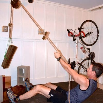 My husband Mark used an old pulley to create a unique exercise station in our man cave.