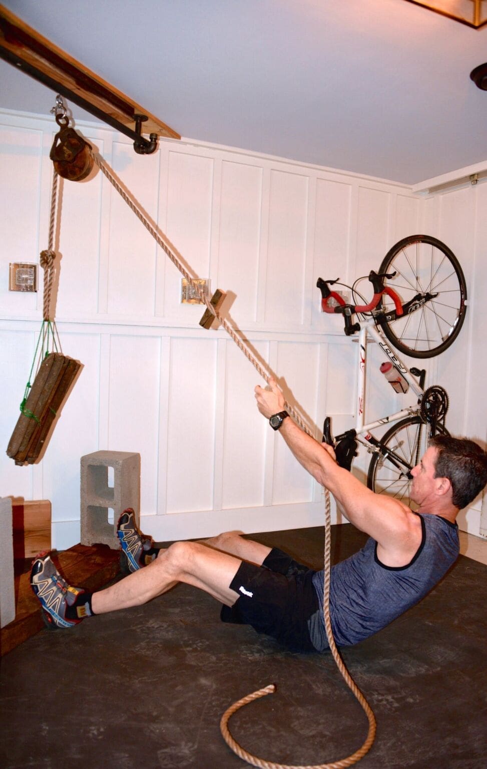 2016 MyFixitUpLife_Mark_Man Cave basement_ exercise room_pully ‣ MyFixitUpLife ‣ MyFixitUpLife My husband Mark used an old pulley to create a unique exercise station in our man cave.