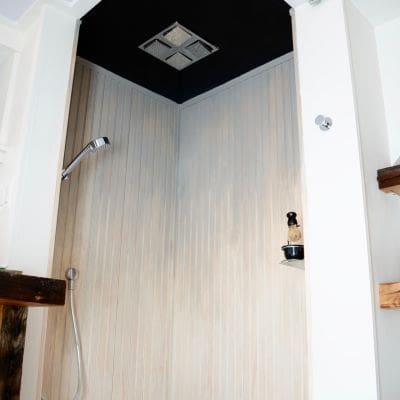 2016 MyFixitUpLife Man Cave Basement shower - wood naturally - American standard