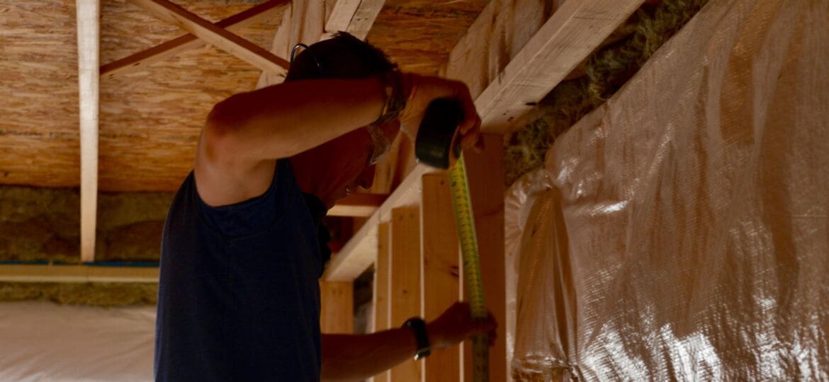 2016_MyFixitUpLife_Mark_Basement_Framing_Studs_Measuring