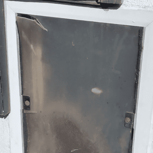 How to Replace a Dog Door by MyFixitUpLife. This is the before.