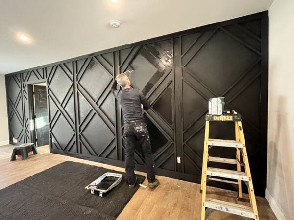 ‣ MyFixitUpLife Painting matte black geometric feature wall - MyFixitUpLife