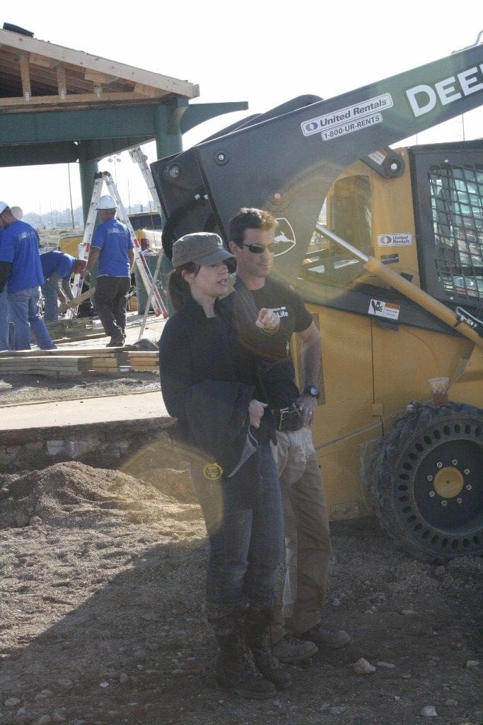 ‣ MyFixitUpLife Theresa and Mark at Extreme Makeover Home Edition managing site work.