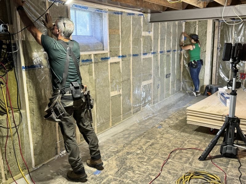 Mark and Theresa install Rockwool insulation and Membrane plastic sheeting