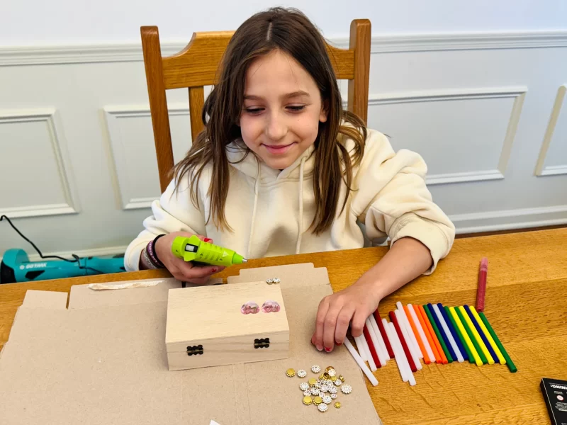 Delia testing the colored glue sticks and Surebonder glue gun