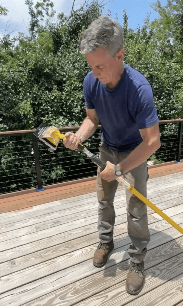 Mark wearing Brunt Workwear Sullivan boots while staining a deck
